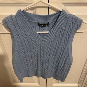 Blue sweater vest